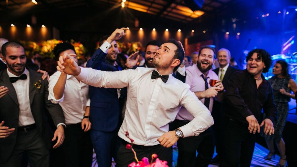 people dancing at a wedding