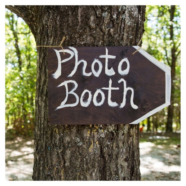 A rustic sign for a photo booth