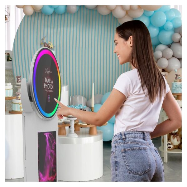 A woman uses the Sapphire iPad photo booth shell