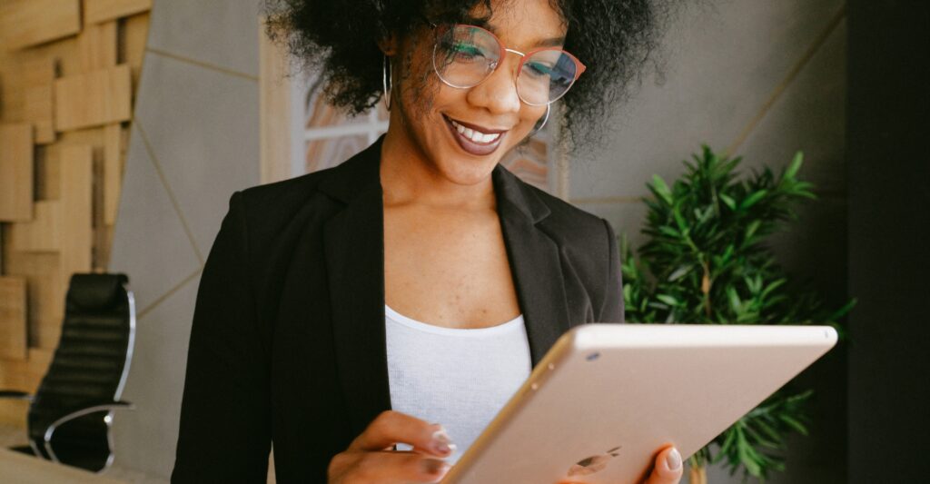 woman looking at ipad